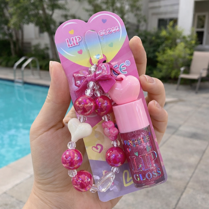 GLOSS CON DESTELLOS SUTILES BRILLANTES Y LLAVERO AY031